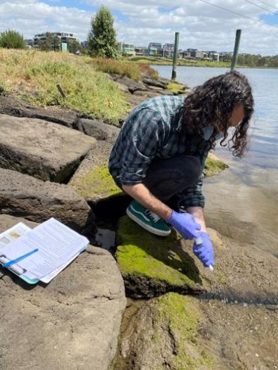citizen scientist volunteer taking water samples